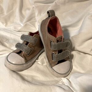 Converse for your toddler! Size 7. Gold and white. Loved but lots of life left!